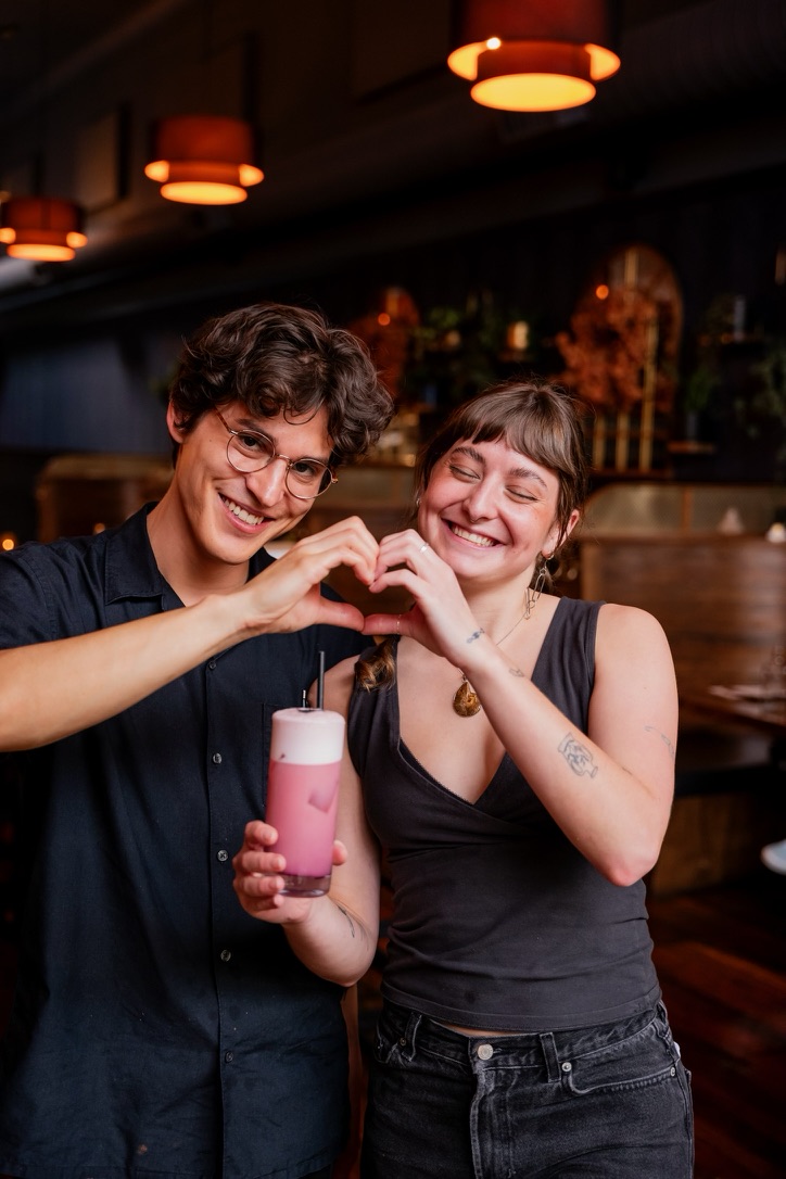 Ryan and coworker Mercy with a cocktail